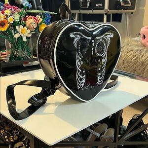 Morticia Addams glossy BackPack